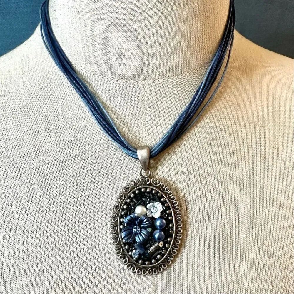 Blue floral beaded pendant necklace on multi cord